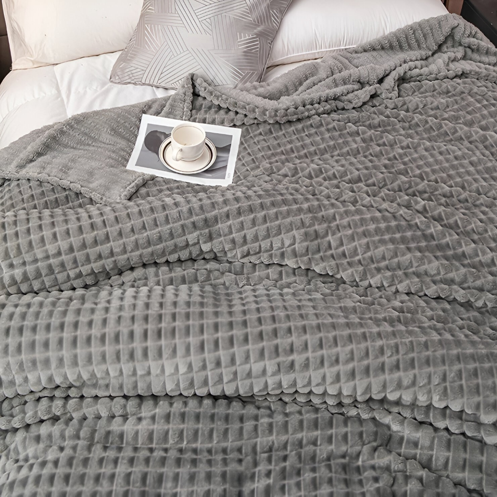 WaveLuxe Pläd – Ultrafluffig Strukturerad Korallfleece