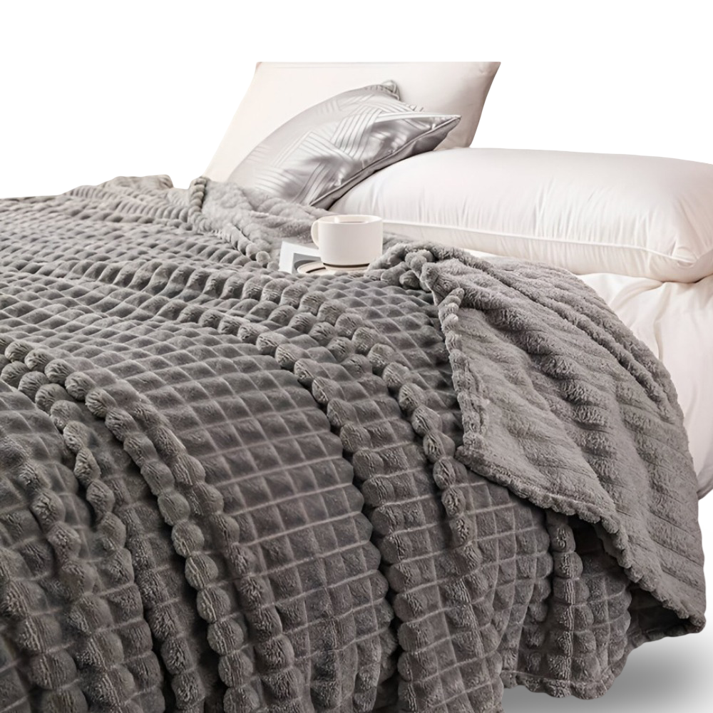 WaveLuxe Pläd – Ultrafluffig Strukturerad Korallfleece