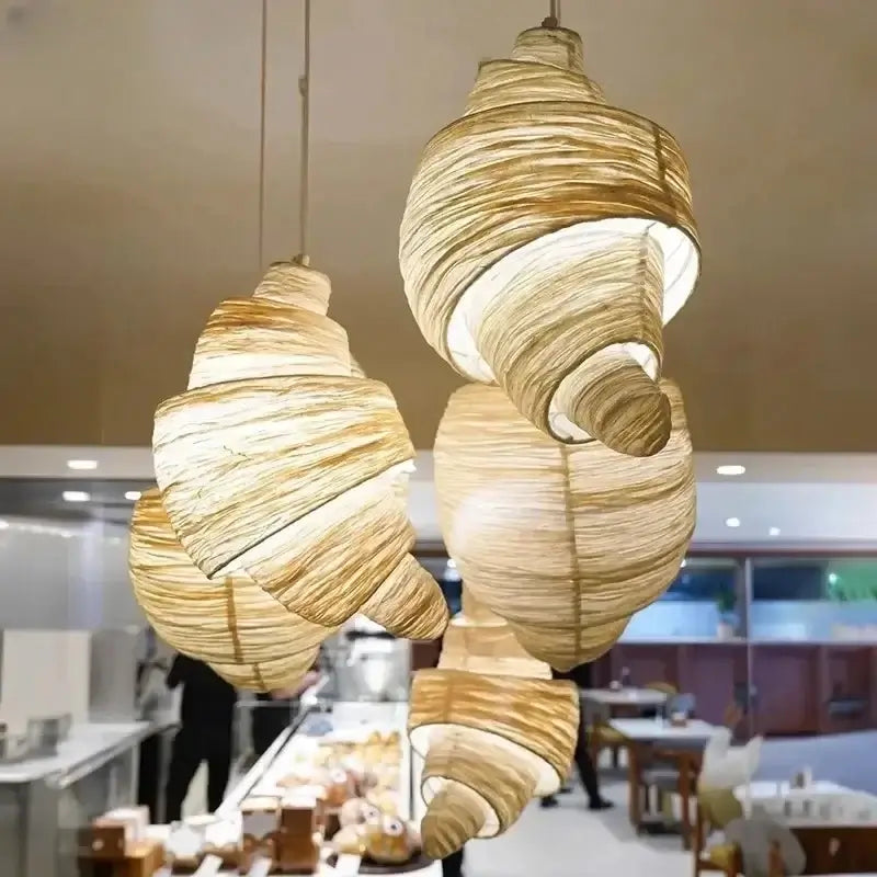 Spiralformad pendellampa i tyg med järnbas