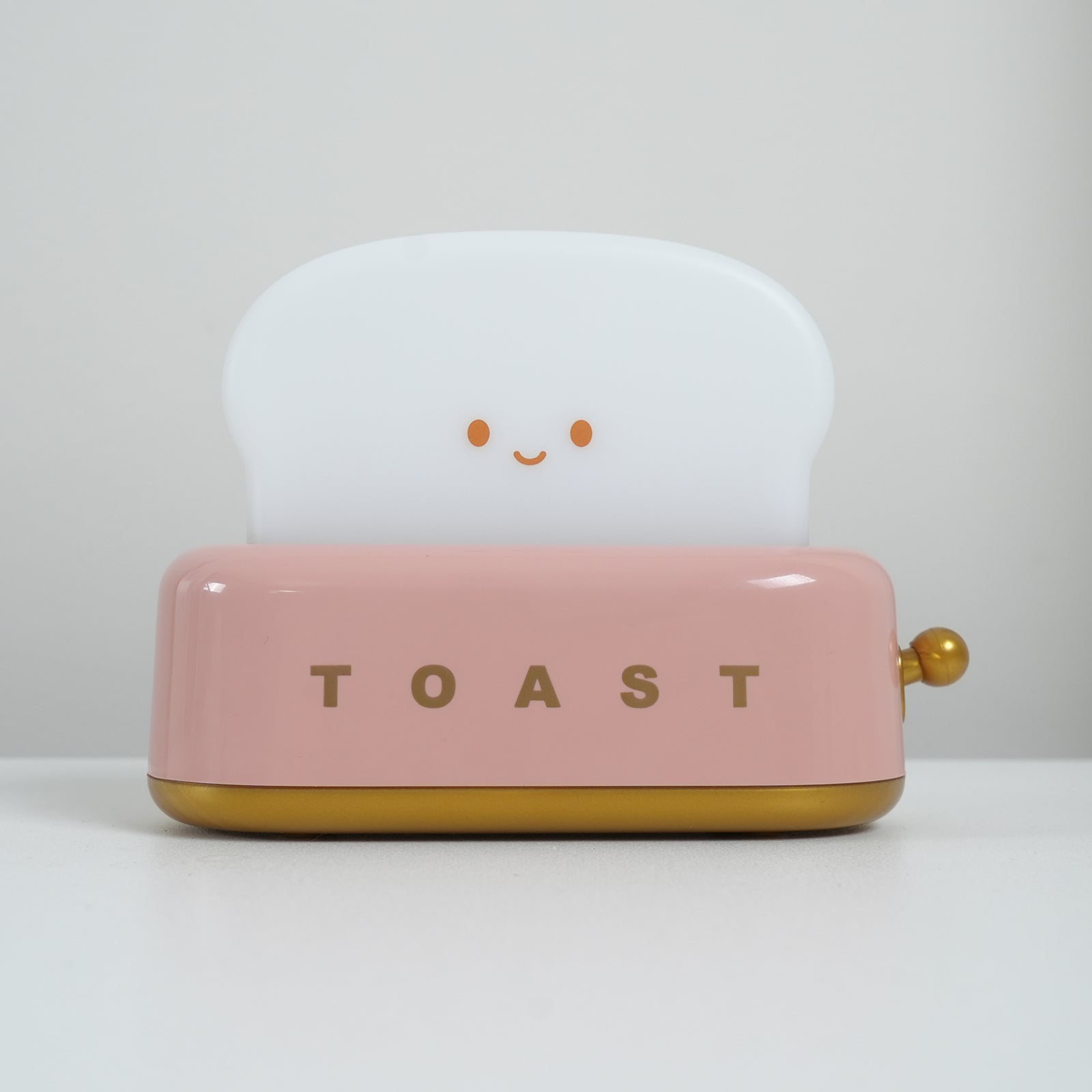 ToastLjus – Brödrostformad bordslampa med inbyggt batteri och justerbar ljusstyrka