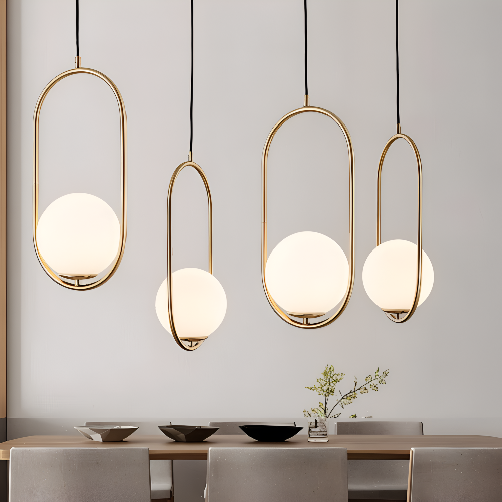 Eclipsera – Modern Guld Ellips Pendellampa med Glaskula