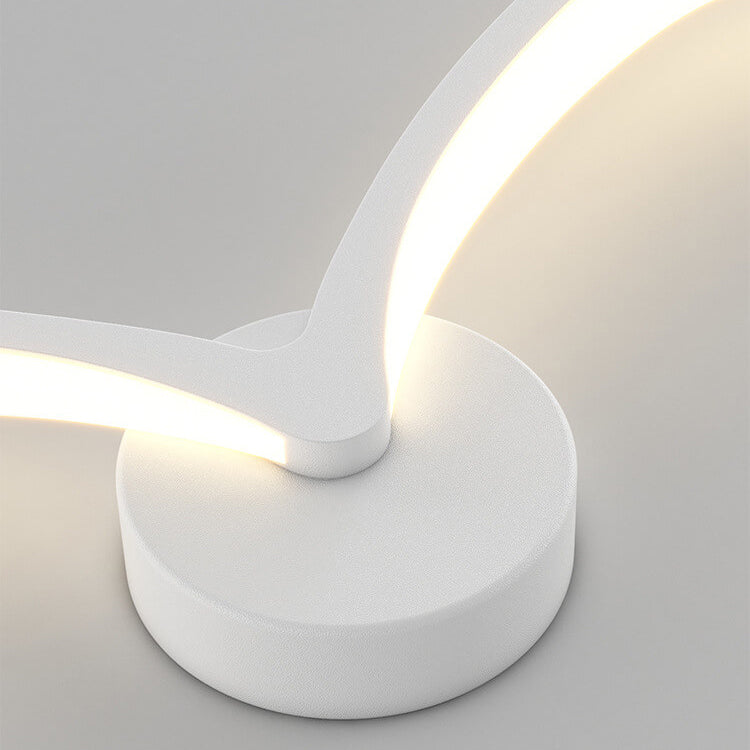 Modern vågformad LED-vägglampa med varmt ljus