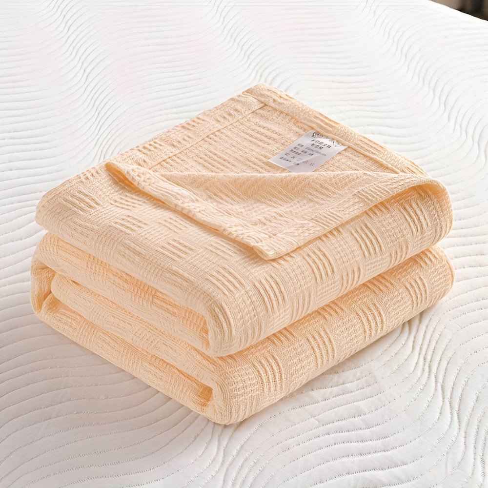 PureBreathe Cozy – Andningsbar Bomullsfleecefilt i Stilren Stickad Design