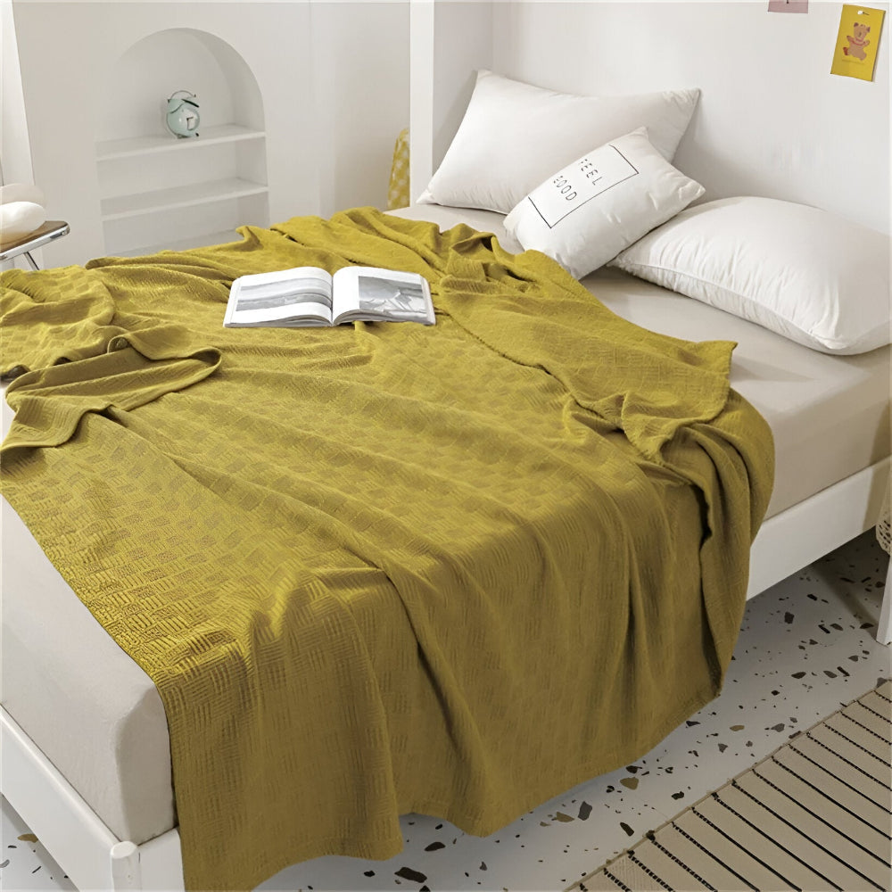 PureBreathe Cozy – Andningsbar Bomullsfleecefilt i Stilren Stickad Design