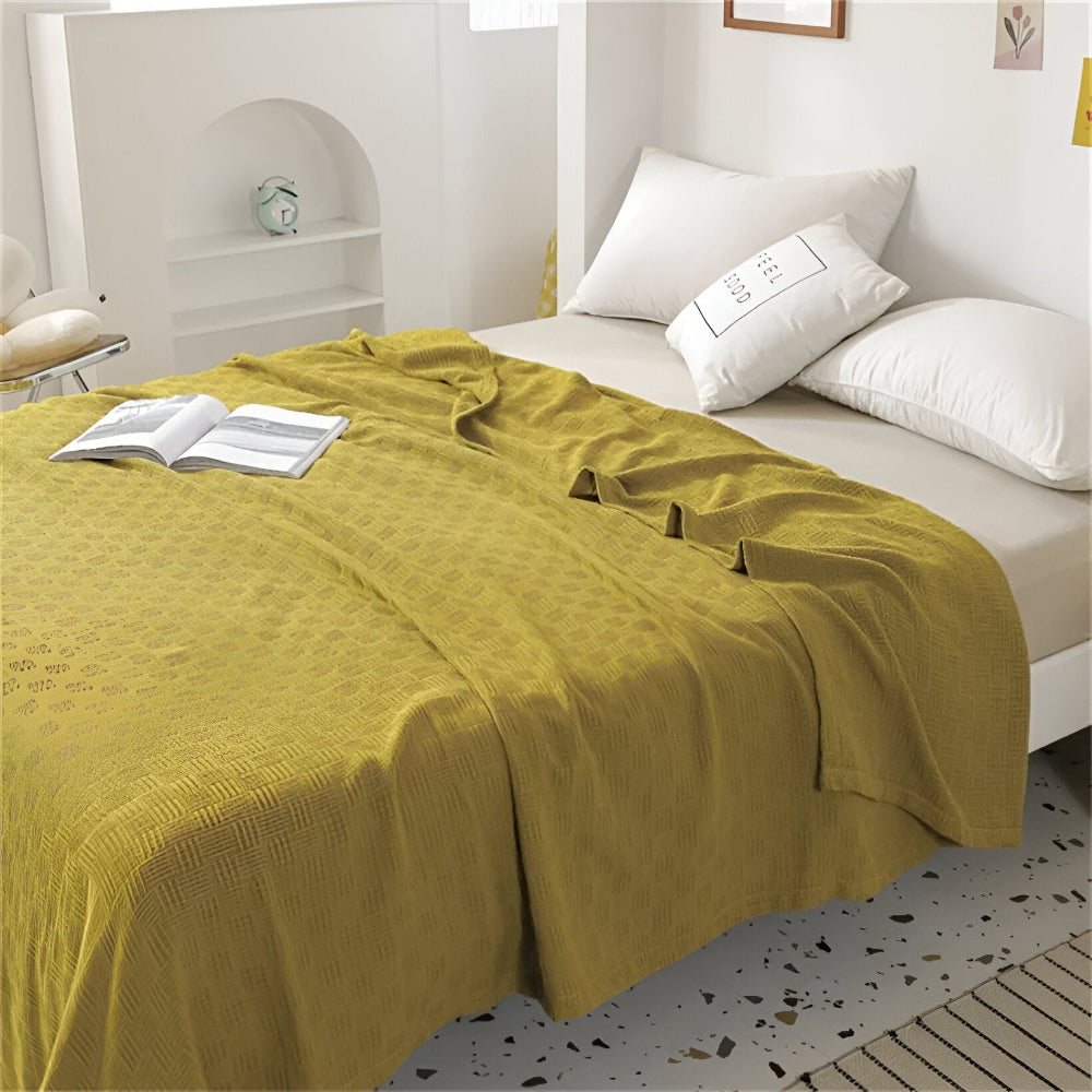PureBreathe Cozy – Andningsbar Bomullsfleecefilt i Stilren Stickad Design