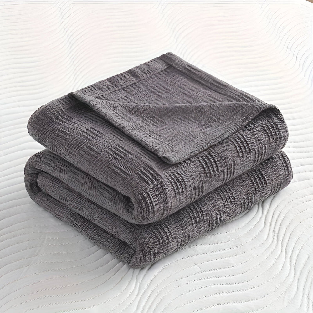 PureBreathe Cozy – Andningsbar Bomullsfleecefilt i Stilren Stickad Design